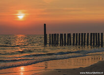 Ansichtkaart zonsondergang Noordzee Ansichtkaart zonsondergang Noordzee