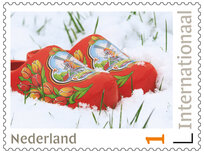 Postzegels 5 x Internationaal klompen