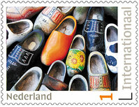 Postzegels 5 x Internationaal klompen