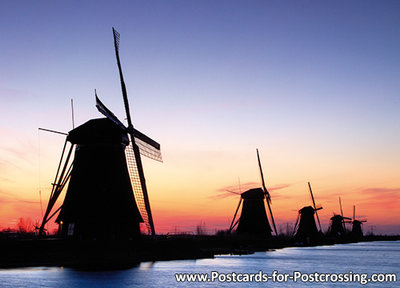 ansichtkaart zonsopkomst molens van Kinderdijk